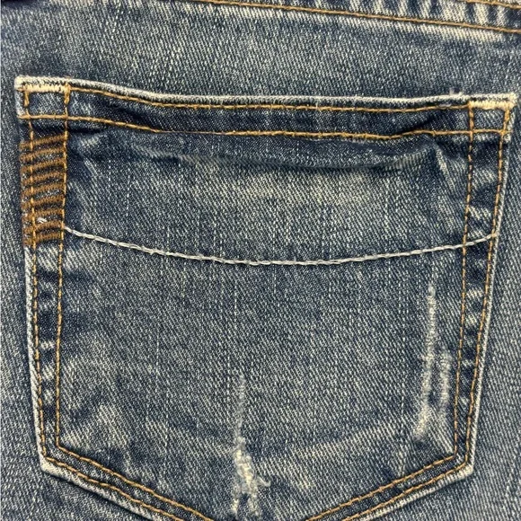 PAIGE Distressed Medium Blue Denim Shorts - Picture 7 of 8